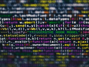 Vibrant close-up of multicolor programming code lines displayed on a screen.